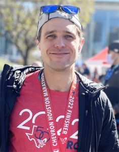 photo of Josh Heine after completing the Houston marathon